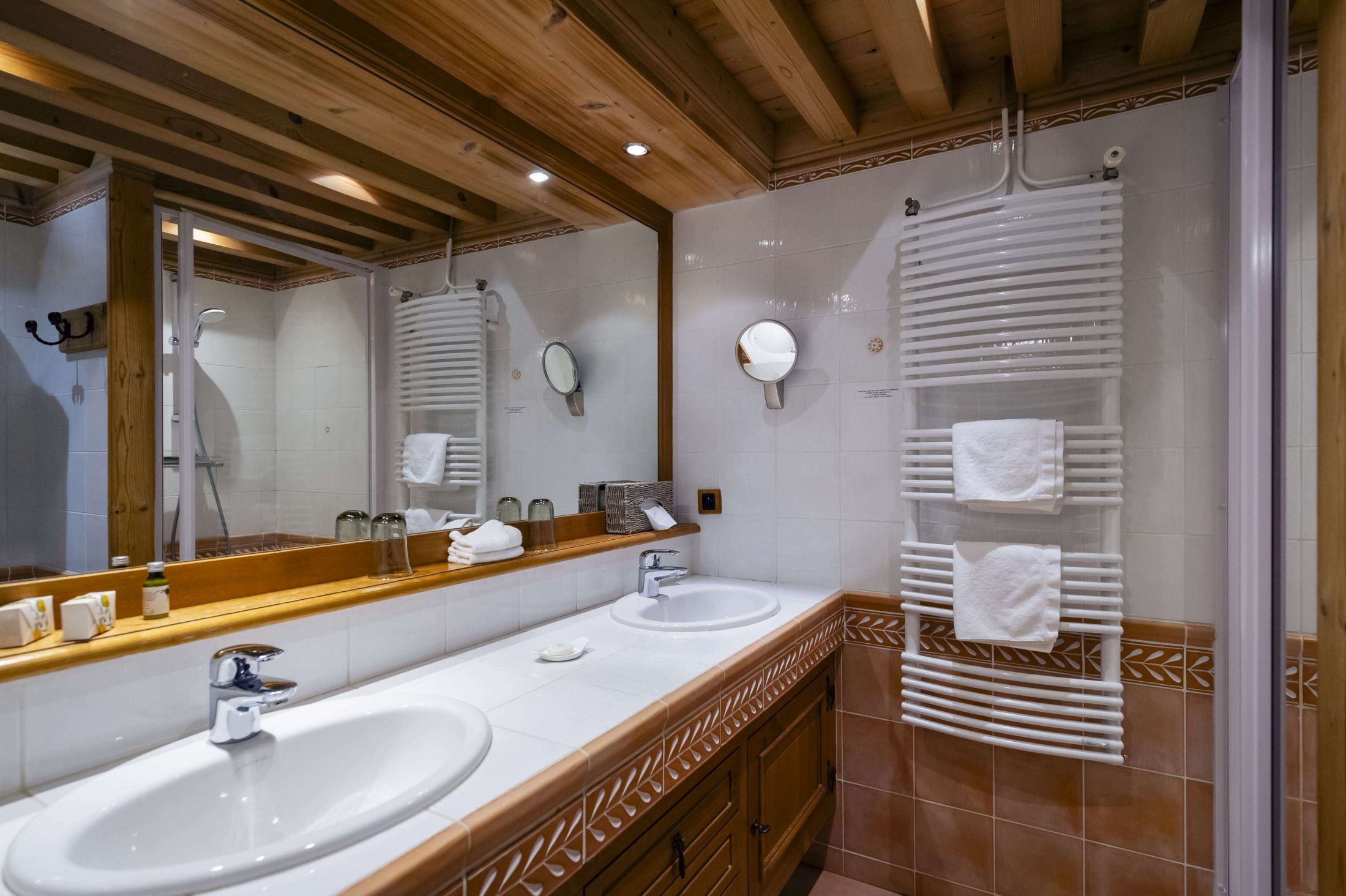 Plume room at Hotel Les Bas Rupts, cozy mountain style with private terrace overlooking the forest